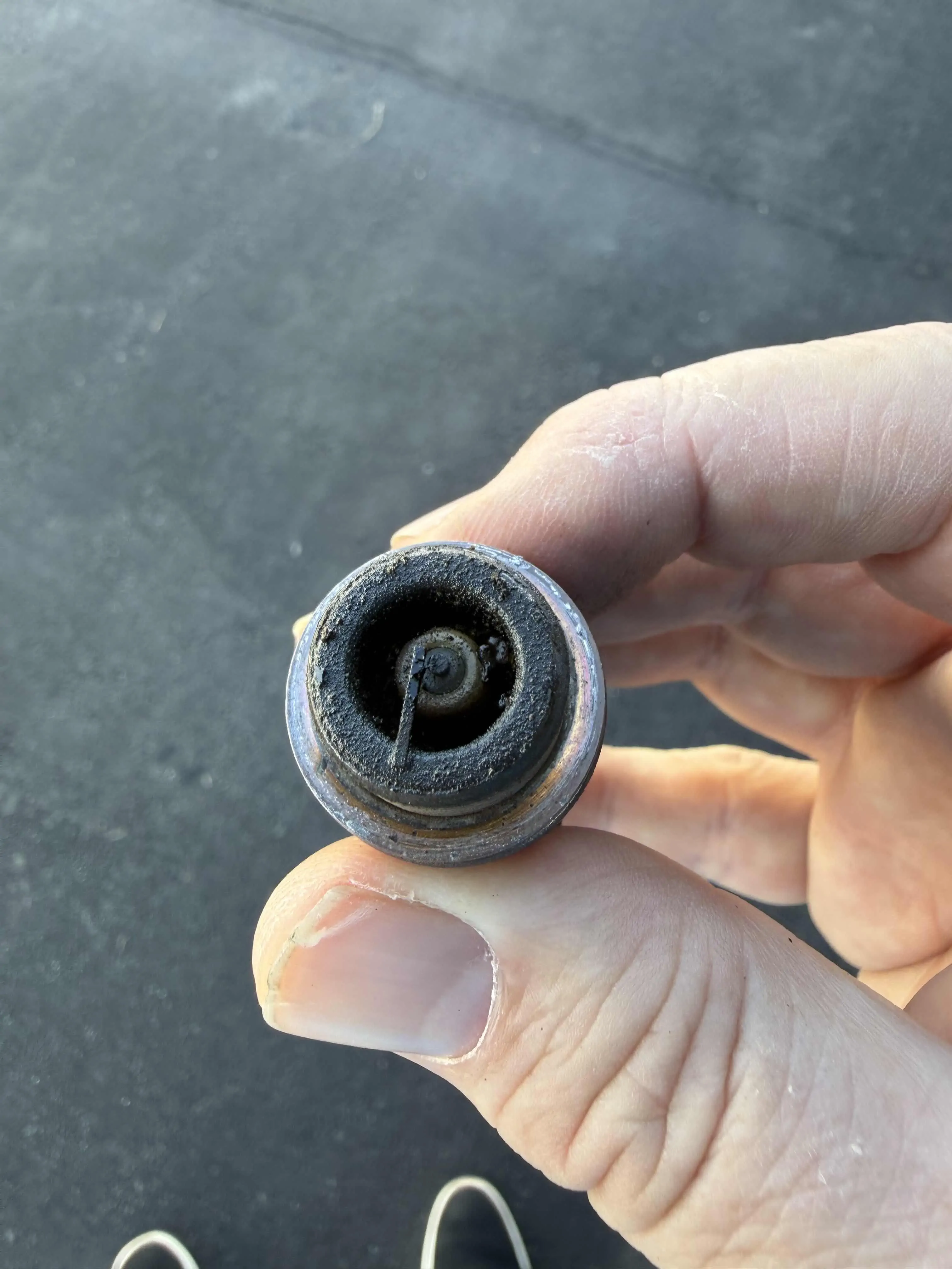 Fouled spark plug before cleaning